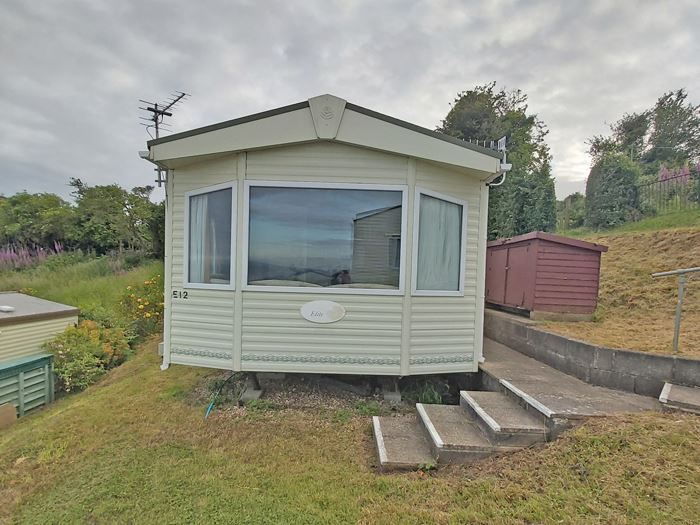 Pet friendly caravan with a private garden and panoramic views across