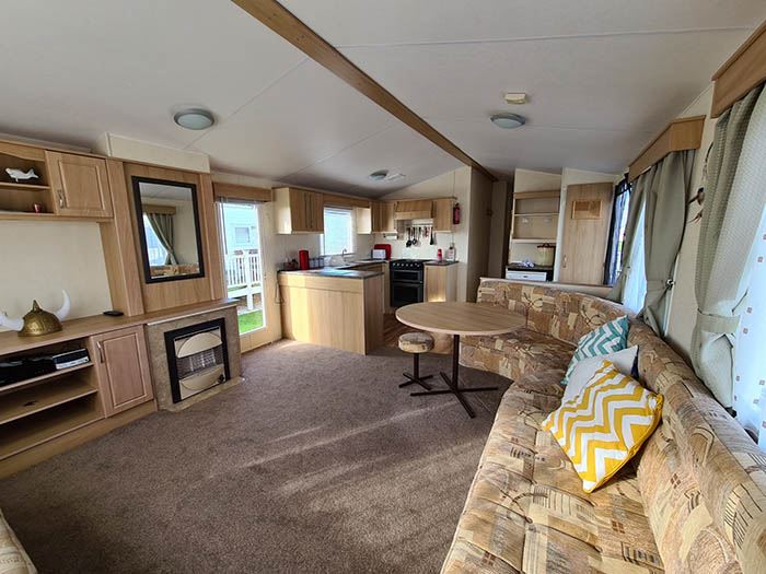 Pet friendly, double glazed caravan with a veranda for hire at Golden ...